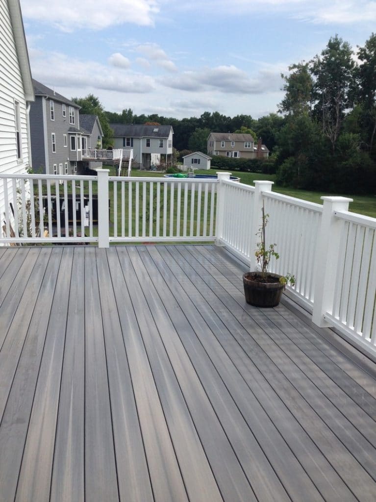 Inspiration for a mid sized timeless backyard patio remodel in Boston with no cover - wood deck railing ideas - HandyMan.Guide - deck railing ideas