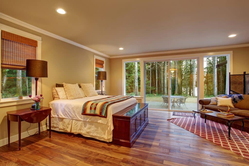 Large master bedroom wth hardwood floor. - 101 Inspiring Master Bedroom Remodel Ideas & Pictures - HandyMan.Guide - Master Bedroom