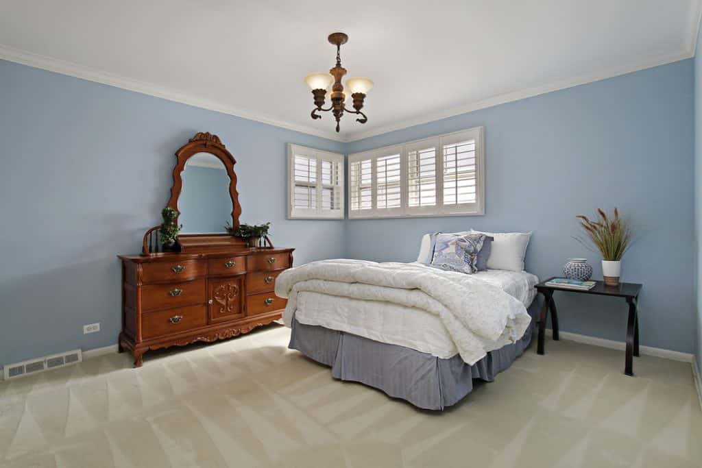 Master bedroom with light blue walls - 101 Inspiring Master Bedroom Remodel Ideas & Pictures - HandyMan.Guide - Master Bedroom