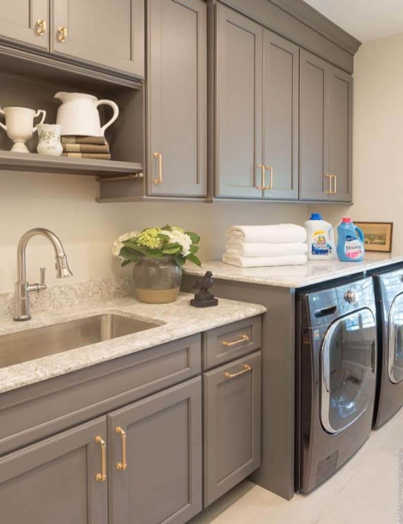 gray laundry room with brass hardware karr bick kitchen and bath - 152 Great Laundry Room Ideas to Maximize Your Laundry Space - HandyMan.Guide - Laundry Room Ideas