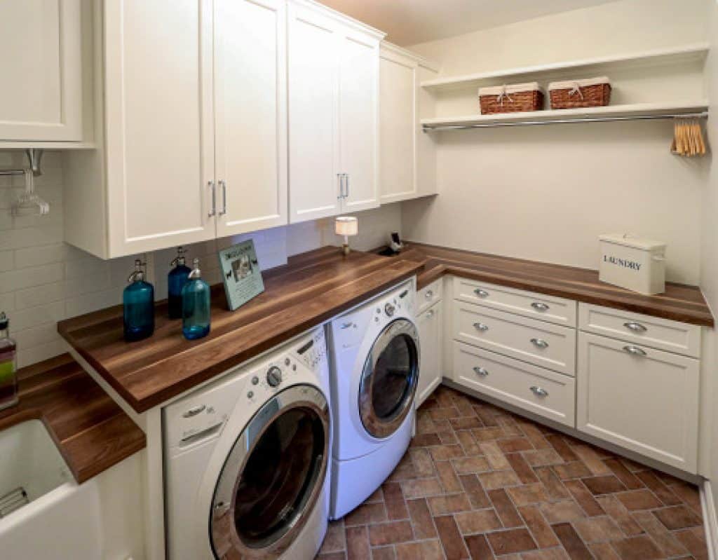 laundry room w custom wood countertops tile backsplash phone charging station cabinet s top - 152 Great Laundry Room Ideas to Maximize Your Laundry Space - HandyMan.Guide - Laundry Room Ideas