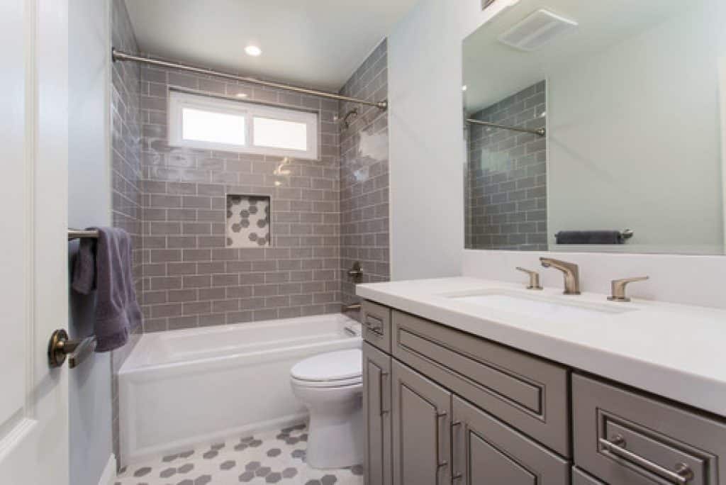 gray tones playfulness a kids bathroom in oak park metropolis drafting and construction inc - 152 Small Bathroom Remodel Ideas & Pictures for 2022 - HandyMan.Guide - Small Bathroom