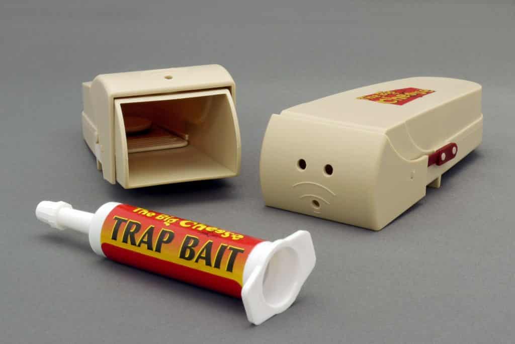 red and white Trap Bait container